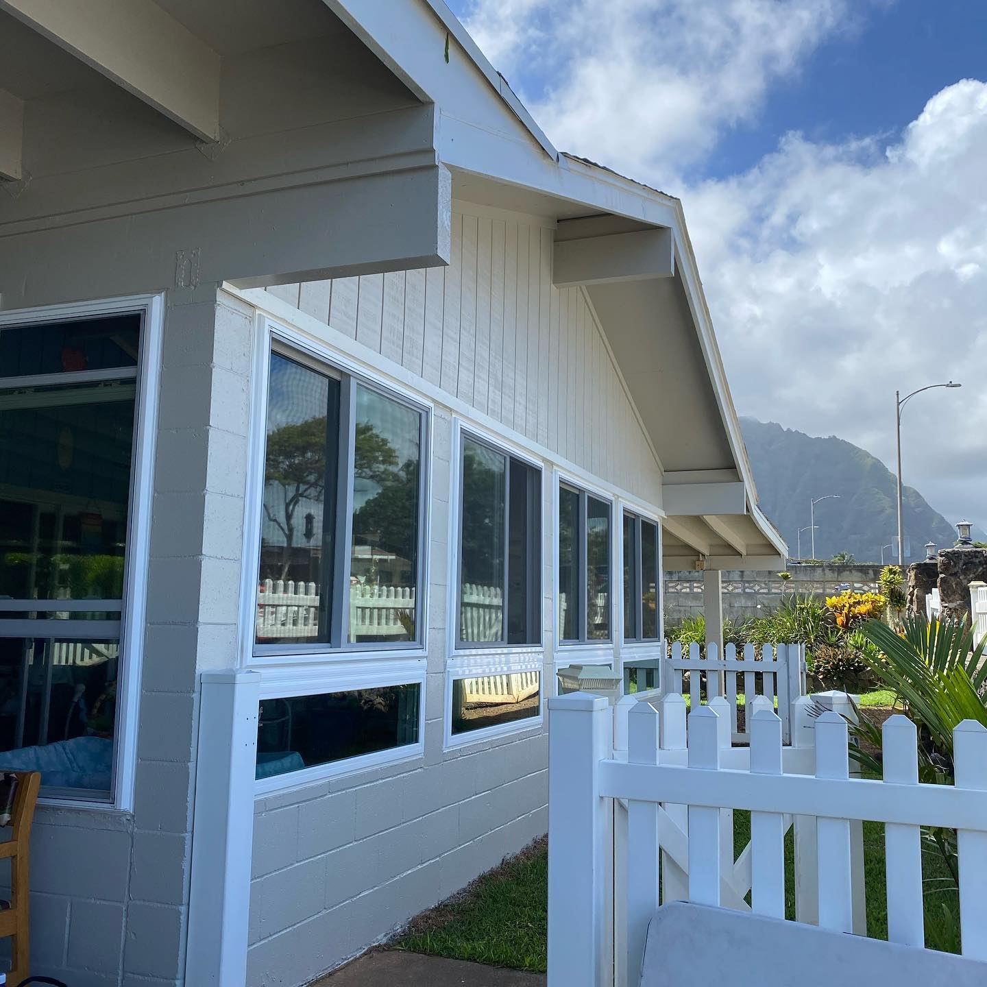 Versatile Coatings Hawaii, repainted windward Oahu home with Ko'olau mountain backdrop