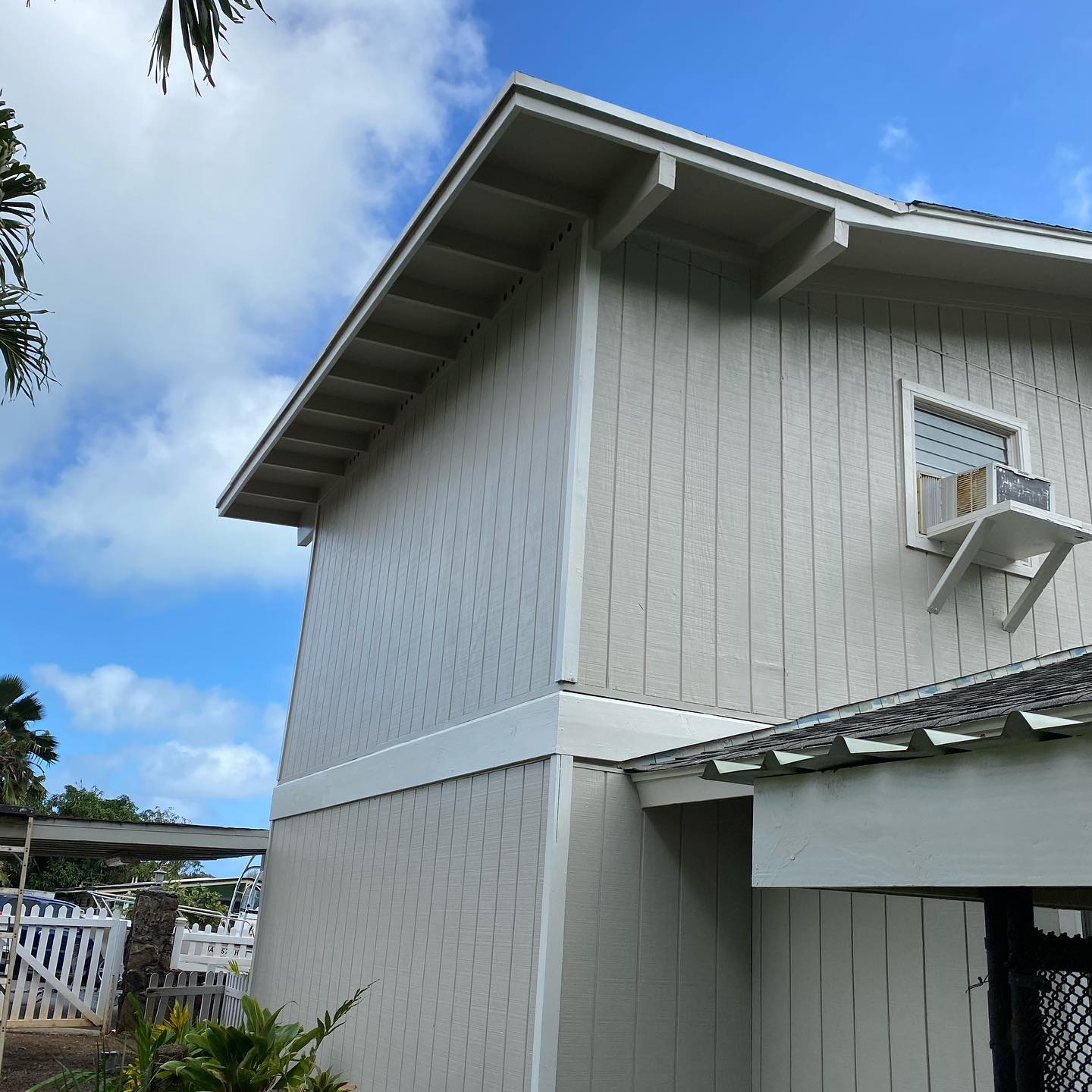 Light grey two-story plantation home repaint